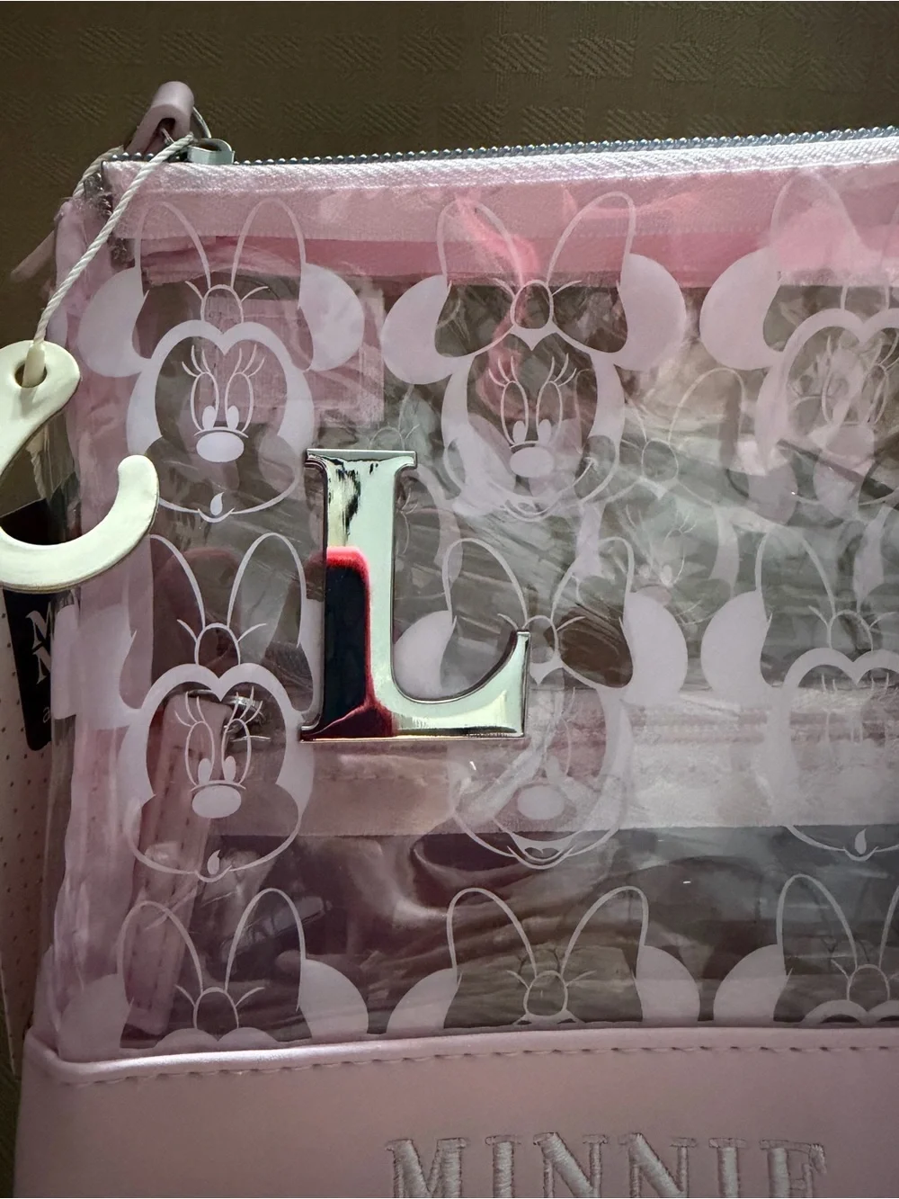 Minnie Mouse Pink Clear Cosmetic Bag “L” monogram on front.